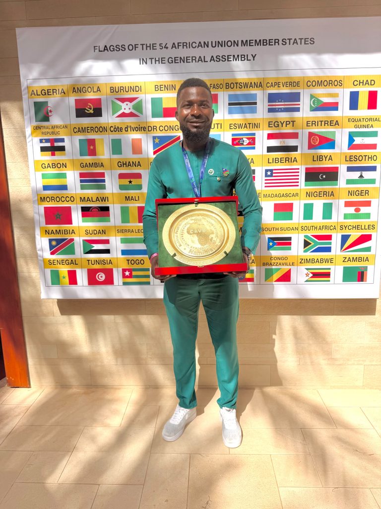 NVF president Tobias Mwatelulo with Namibias Best National Federation Growth and Development Award on Sal Island Cabo Verde 768x1024 1